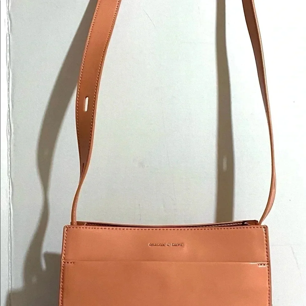Charles & Keith pink poly crossbody handbag